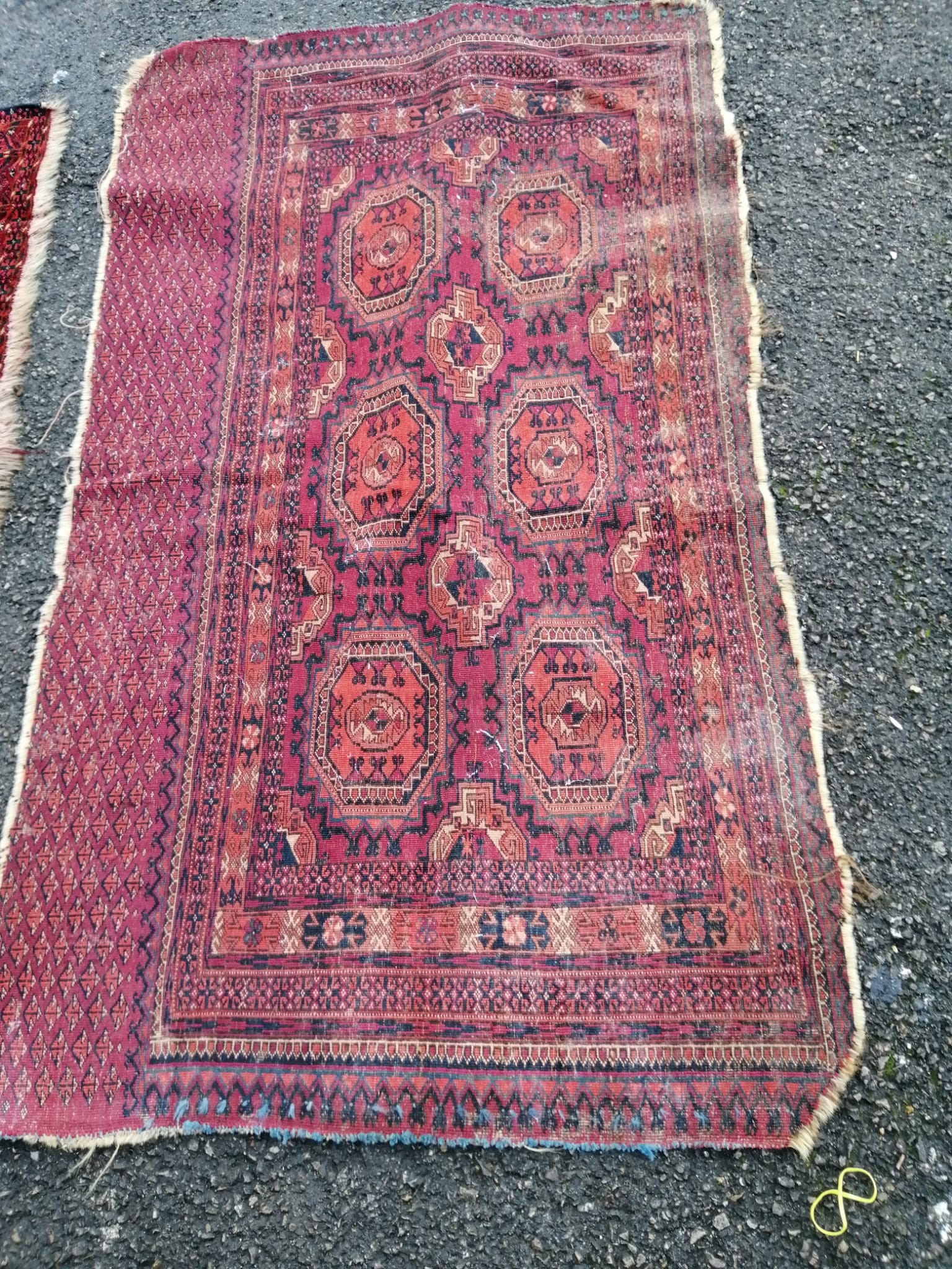 Three antique Salor mats, largest 140 x 82cm